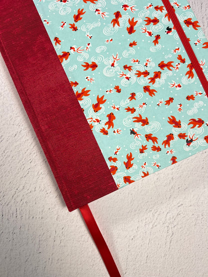 A5 Hardcover Notebook finished in Scarlet Red Japanese Bookcloth and Red/Orange Koi Fish on Aqua Chiyogami Paper