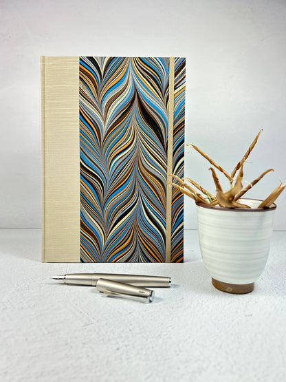 B5 Hardcover Notebook finished in Platinum Japanese book cloth and featuring Renato Crepaldi hand-marbled decorative paper