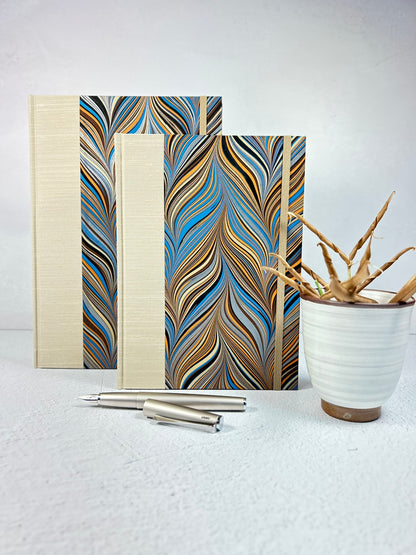 B5 Hardcover Notebook finished in Platinum Japanese book cloth and featuring Renato Crepaldi hand-marbled decorative paper