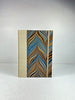 A5 Hardcover Notebook finished in Platinum Japanese book cloth and featuring Renato Crepaldi hand-marbled decorative paper