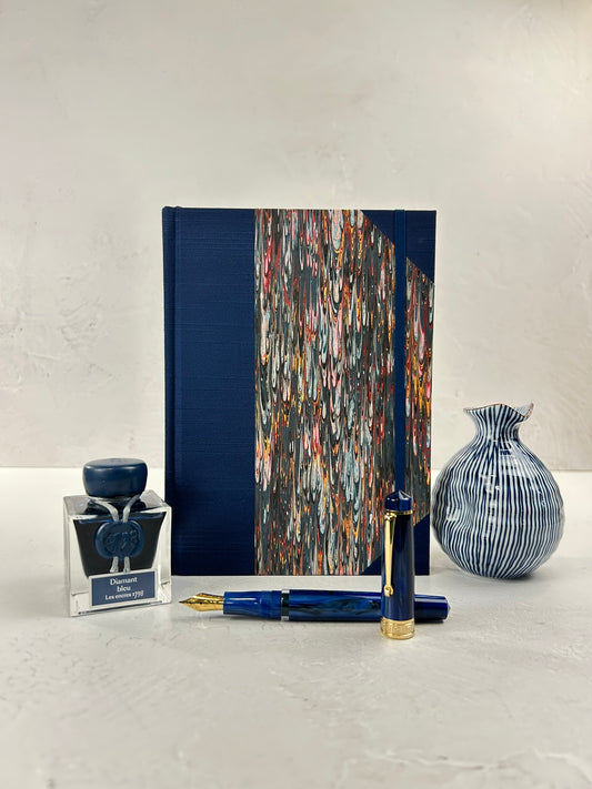 A5 160-page Hardcover Journal finished in Cadette Blue Japanese book cloth and French Marbled Paper