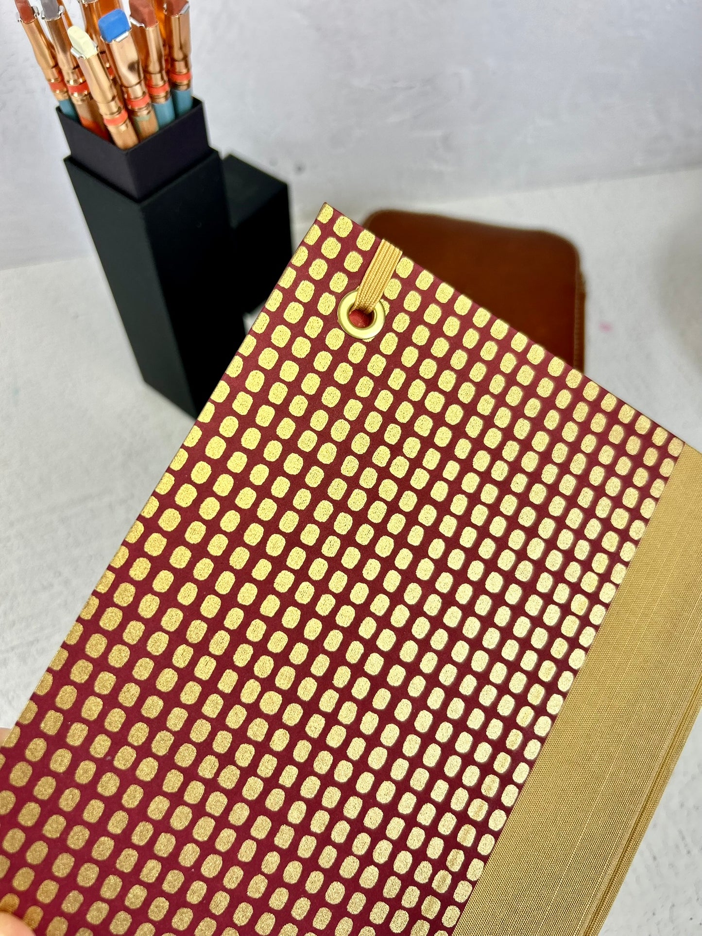 A5 160-page Hardcover Notebook finished in luxurious Soft Gold Japanese Bookcloth with Golden Dots on Wine Chiyogami Japanese Paper