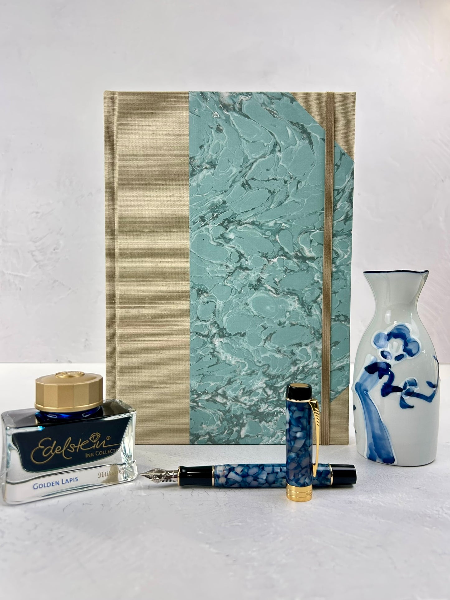 B5 192-page Hardcover Journal in finished in Platinum Japanese book cloth and light blue French Marble Paper
