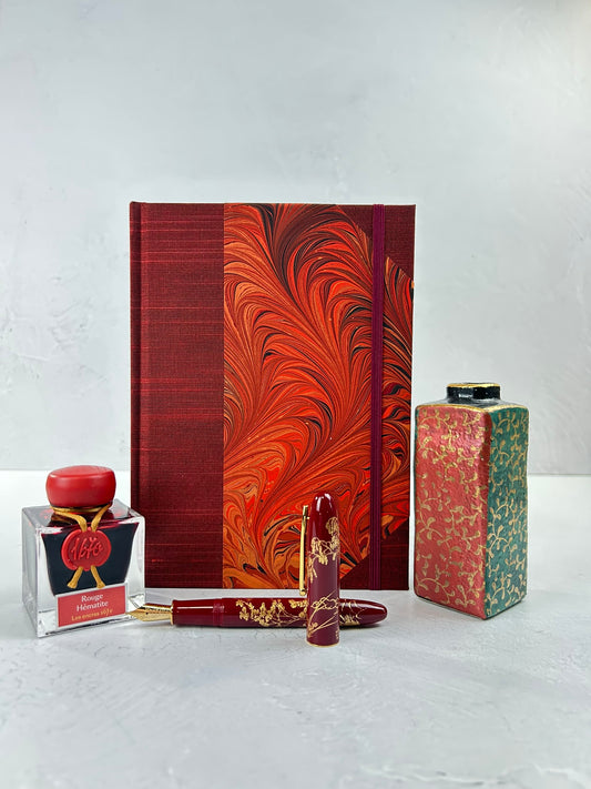 A5 160-page Hardcover Journal finished in Dark Red Japanese book cloth and hand marbled paper by Daniel Gaál
