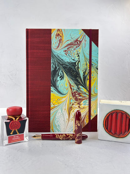 B5 192-page Hardcover Journal finished in Dark Red Japanese book cloth and hand marbled paper by Daniel Gaál