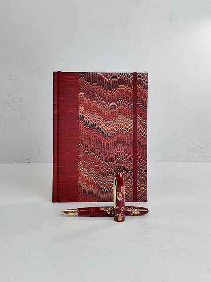 A5 160-page Hardcover Journal finished in Blood Red Japanese book cloth and Renato Crepaldi hand marbled paper