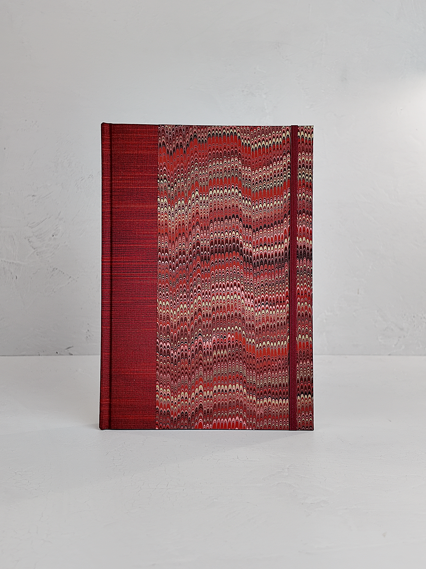 B5 192-page Hardcover Journal finished in Blood Red Japanese book cloth and Renato Crepaldi hand marbled paper