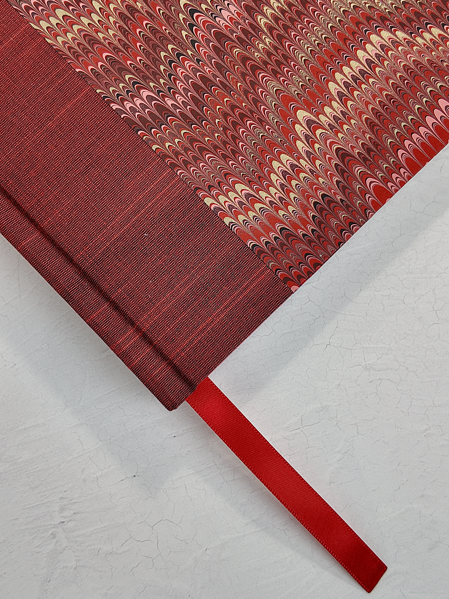 B5 192-page Hardcover Journal finished in Blood Red Japanese book cloth and Renato Crepaldi hand marbled paper