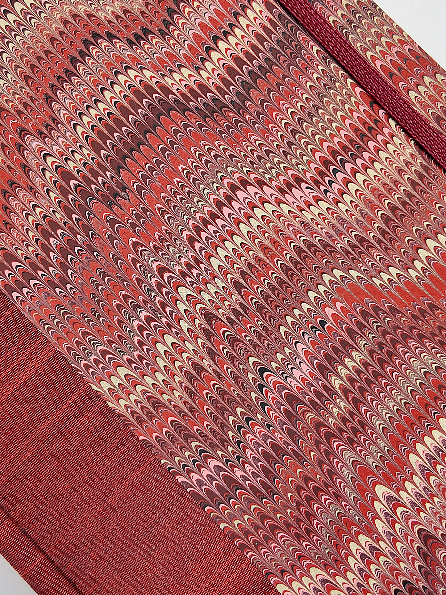 B5 192-page Hardcover Journal finished in Blood Red Japanese book cloth and Renato Crepaldi hand marbled paper