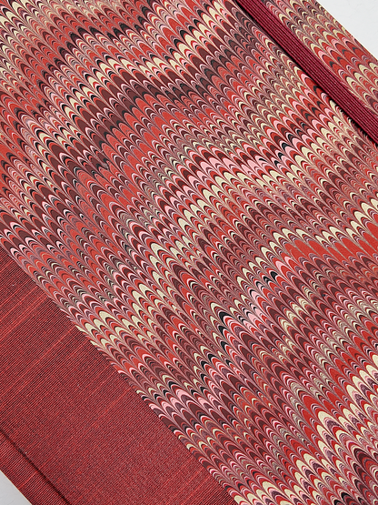 A5 160-page Hardcover Journal finished in Blood Red Japanese book cloth and Renato Crepaldi hand marbled paper