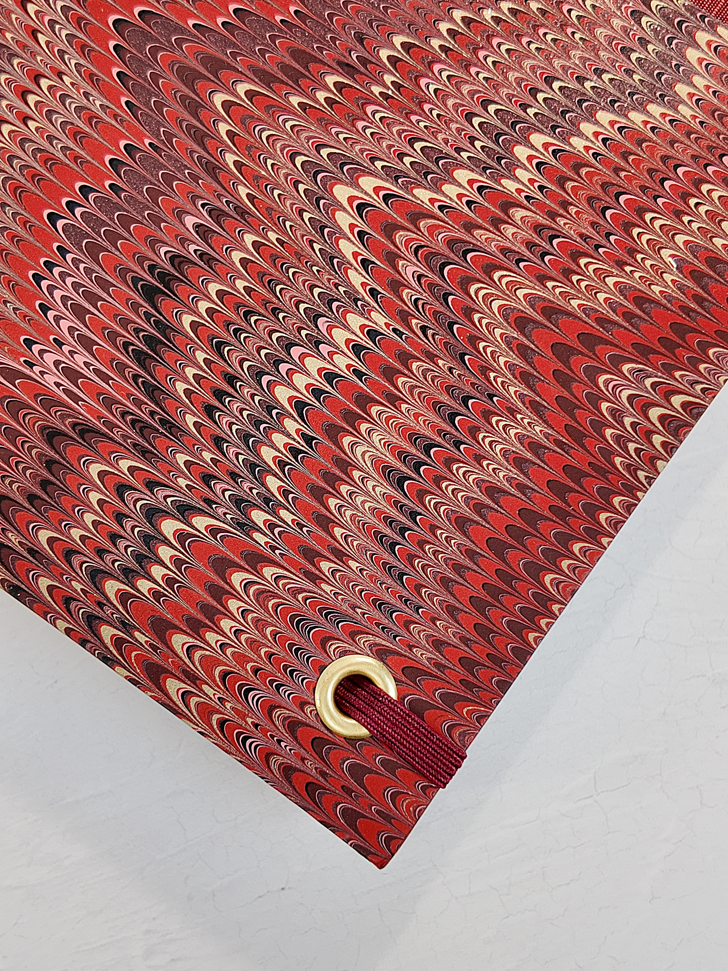 B5 192-page Hardcover Journal finished in Blood Red Japanese book cloth and Renato Crepaldi hand marbled paper