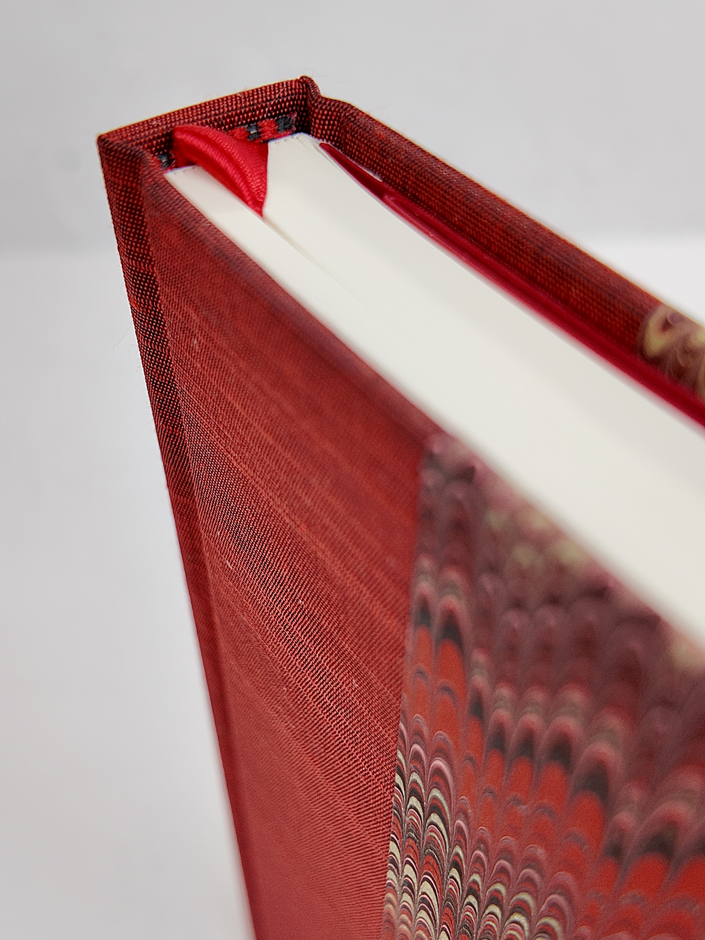 A5 160-page Hardcover Journal finished in Blood Red Japanese book cloth and Renato Crepaldi hand marbled paper