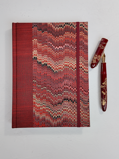 A5 160-page Hardcover Journal finished in Blood Red Japanese book cloth and Renato Crepaldi hand marbled paper
