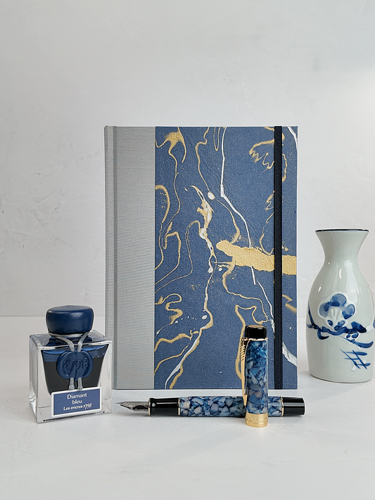 A5 160-page Hardcover Journal finished in Blue/Silver Japanese book cloth and hand marbled Indian paper