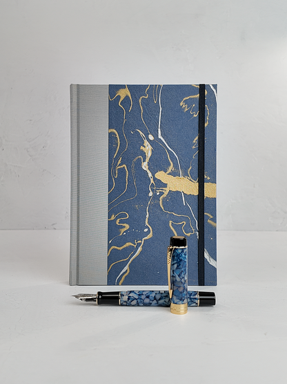 A5 160-page Hardcover Journal finished in Blue/Silver Japanese book cloth and hand marbled Indian paper