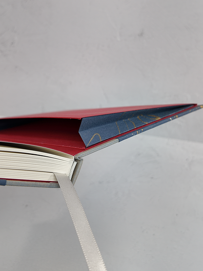 A5 160-page Hardcover Journal finished in Blue/Silver Japanese book cloth and hand marbled Indian paper