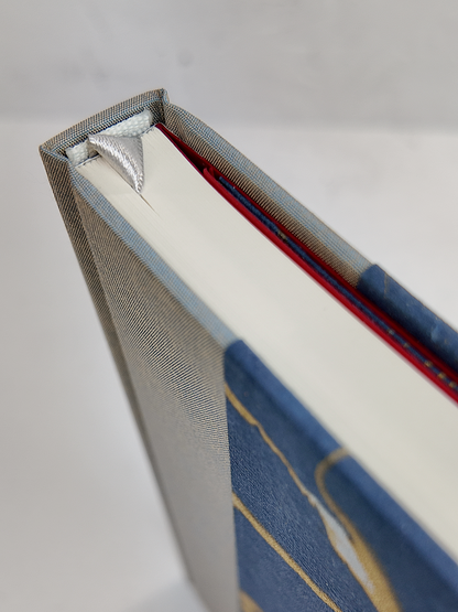 A5 160-page Hardcover Journal finished in Blue/Silver Japanese book cloth and hand marbled Indian paper