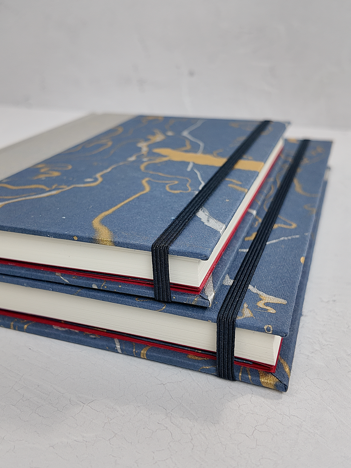 A5 160-page Hardcover Journal finished in Blue/Silver Japanese book cloth and hand marbled Indian paper