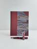A5 160-page Hardcover Journal finished in Rust Blue Japanese book cloth and Renato Crepaldi hand marbled paper