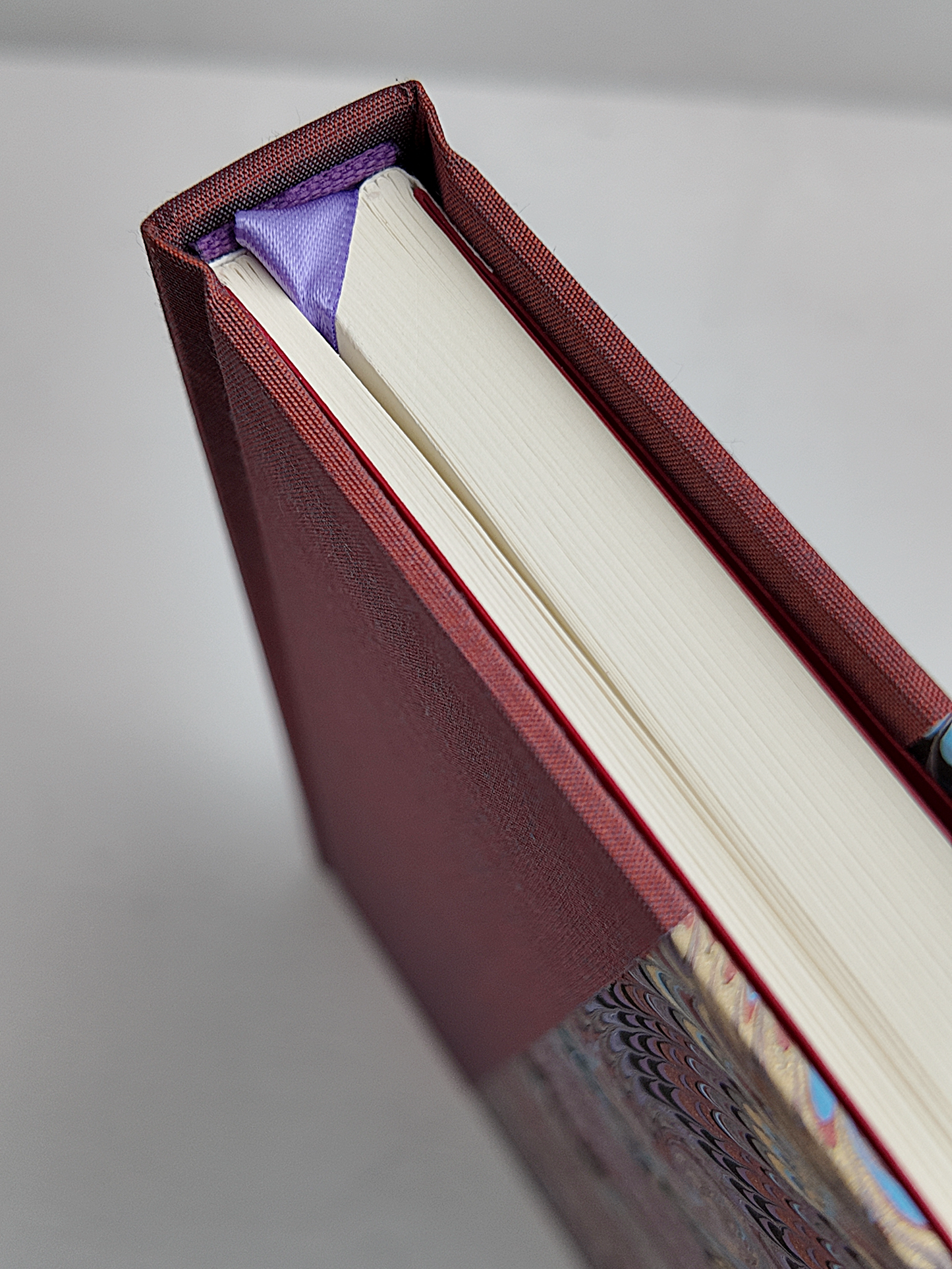 NEW A5 160-page Hardcover Journal finished in Rust Blue Japanese book cloth and Renato Crepaldi hand marbled paper