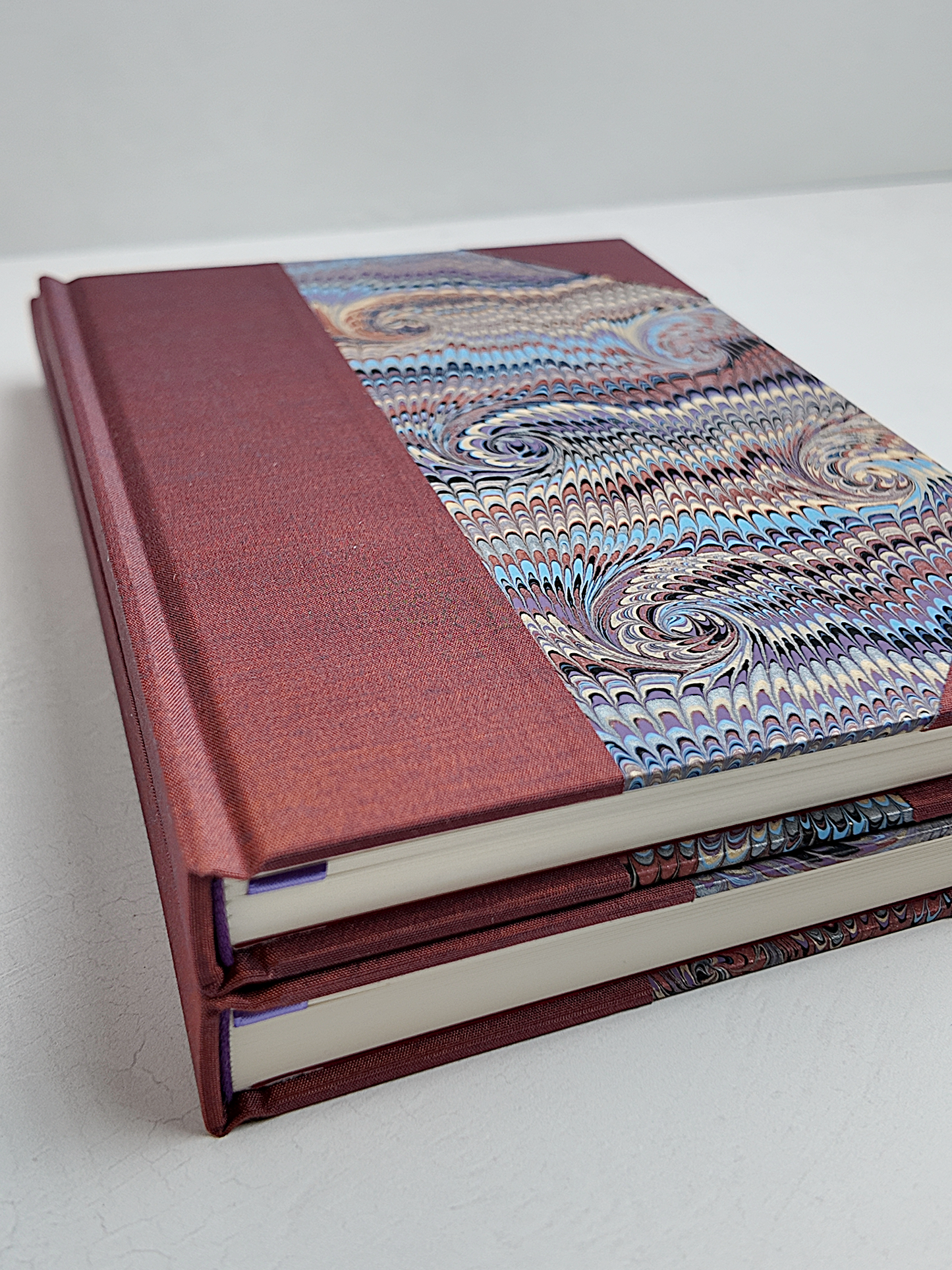 NEW A5 160-page Hardcover Journal finished in Rust Blue Japanese book cloth and Renato Crepaldi hand marbled paper