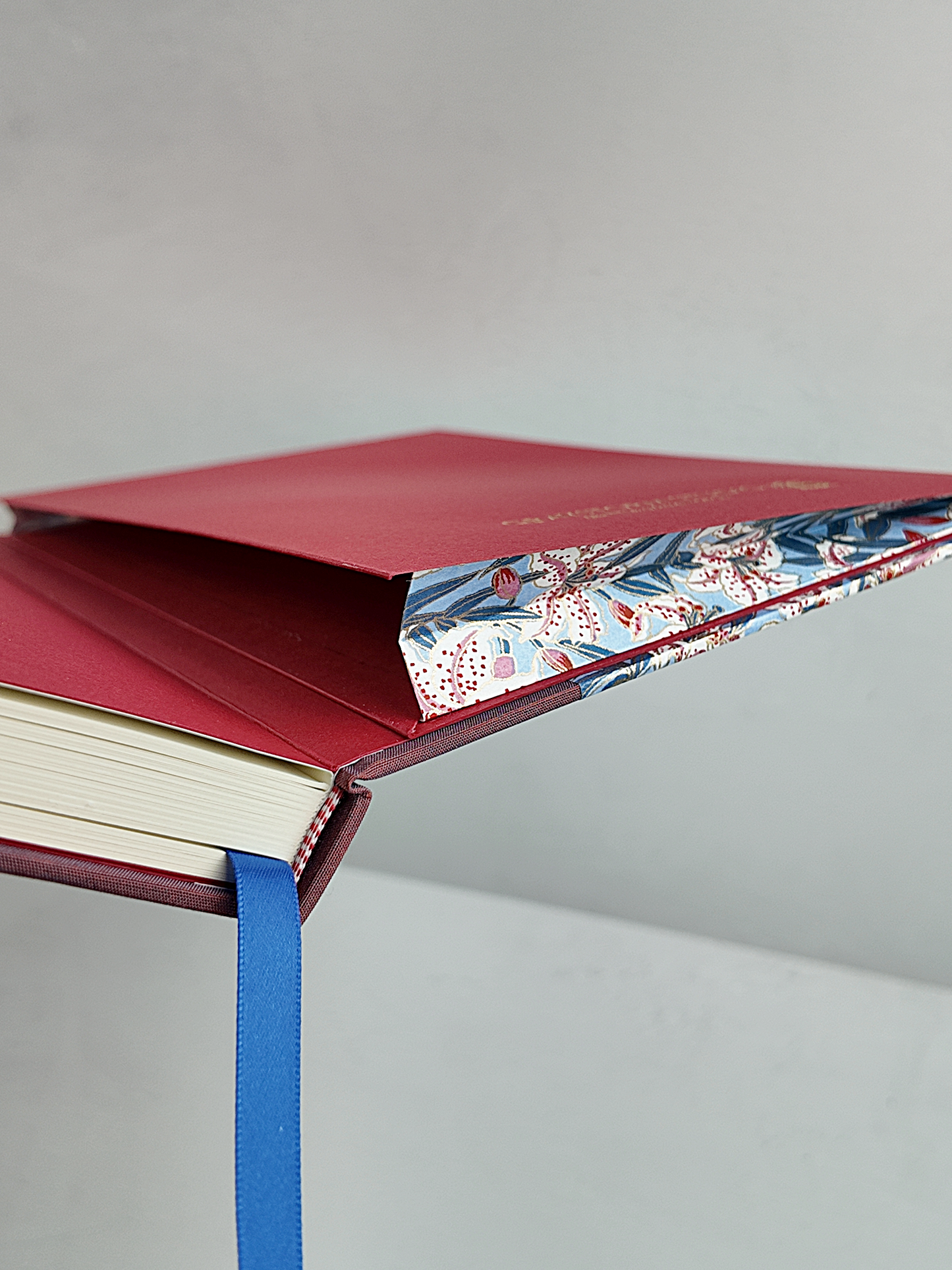 NEW A5 160-page Hardcover Journal finished in Rust Blue Japanese book cloth and white Lilies on blue Chiyogami Paper
