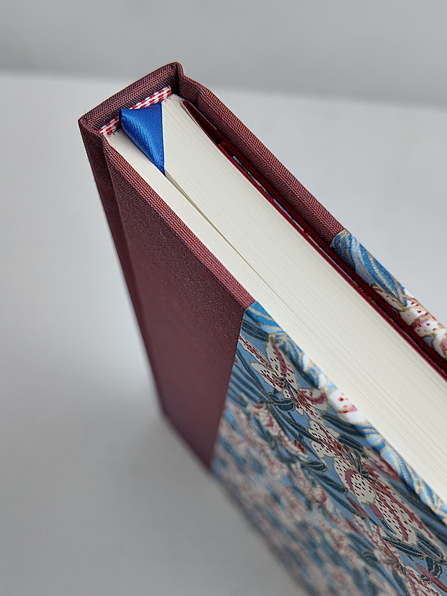 NEW A5 160-page Hardcover Journal finished in Rust Blue Japanese book cloth and white Lilies on blue Chiyogami Paper