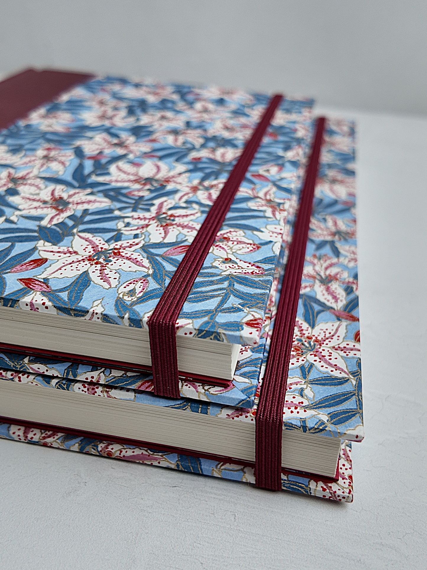 NEW A5 160-page Hardcover Journal finished in Rust Blue Japanese book cloth and white Lilies on blue Chiyogami Paper