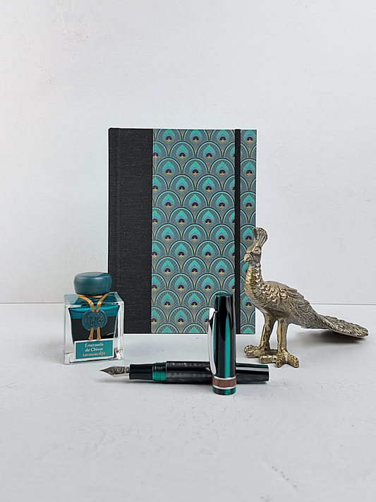 A5 160-page Hardcover Journal finished in Black Mohair Japanese book cloth and a silk screened peacock paper