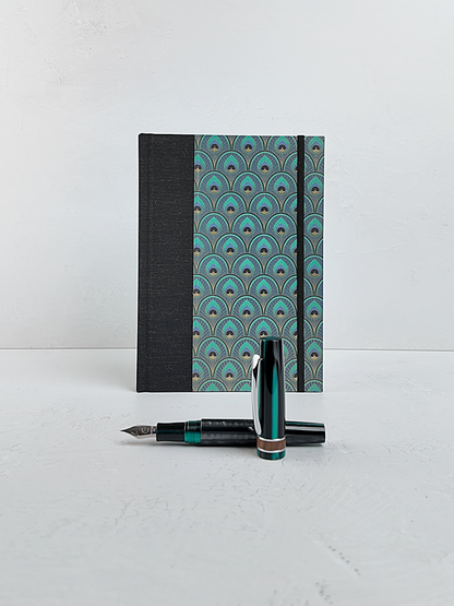 NEW A5 160-page Hardcover Journal finished in Black Mohair Japanese book cloth and a silk screened peacock paper