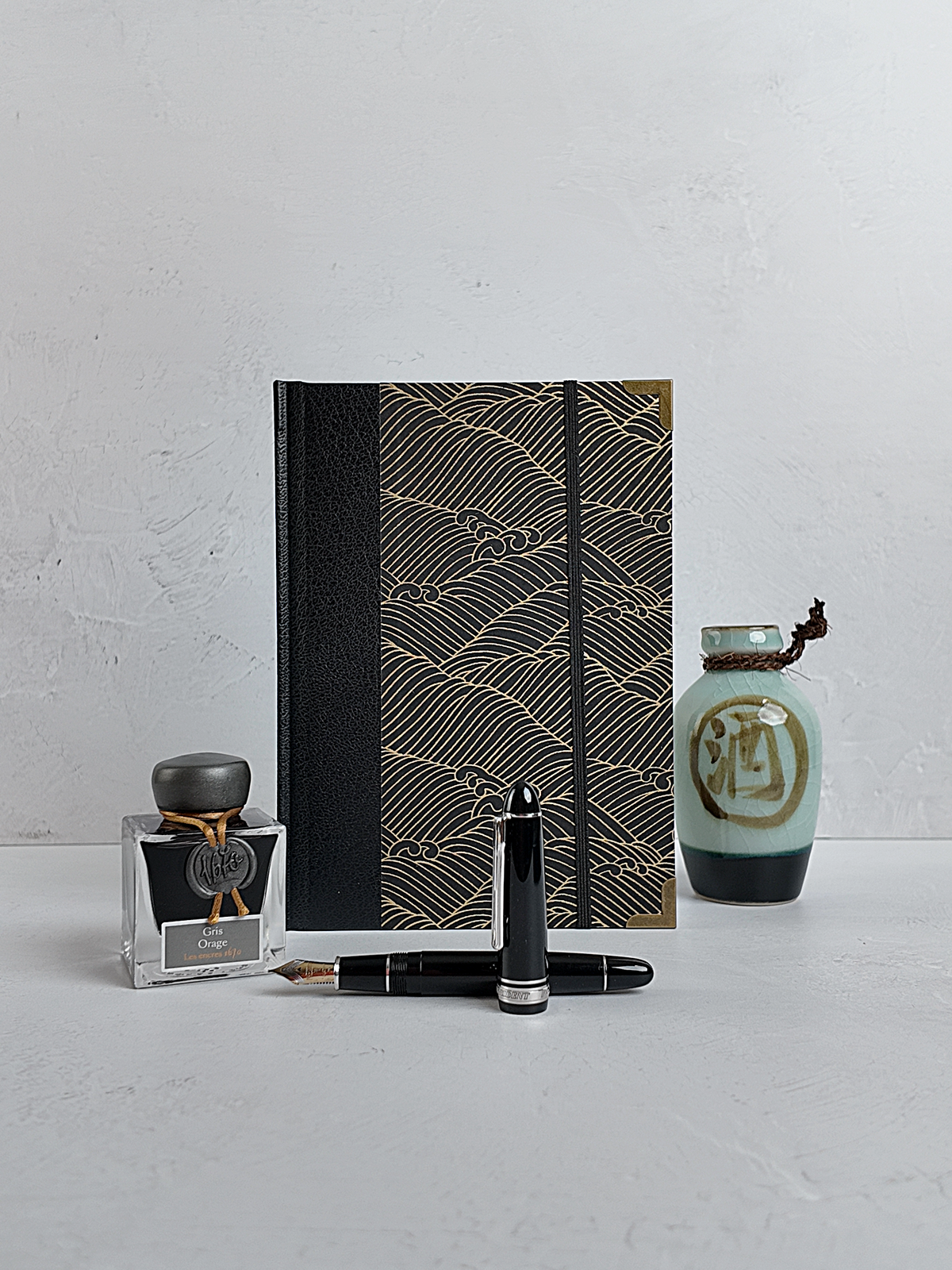 A5 160-page Hardcover Journal finished in black faux leather with gold waves on black Chiyogami Paper