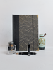 B5 192-page Hardcover Journal finished in black faux leather with gold waves on black Chiyogami Paper