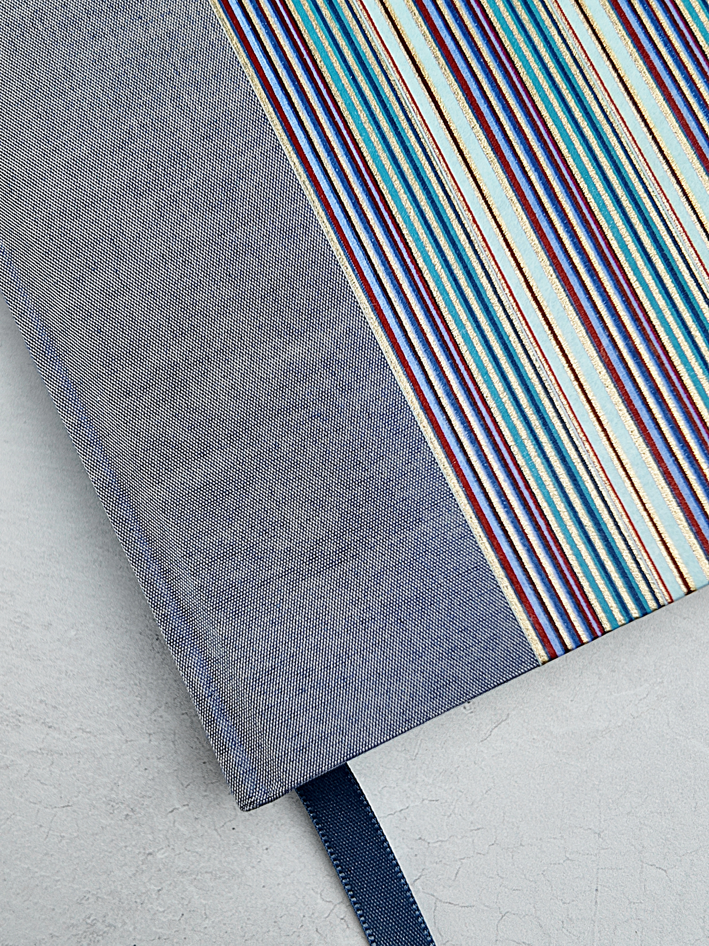 B5 192-page Hardcover Journal finished in Steel Blue Japanese book cloth and pinstripe Chiyogami paper