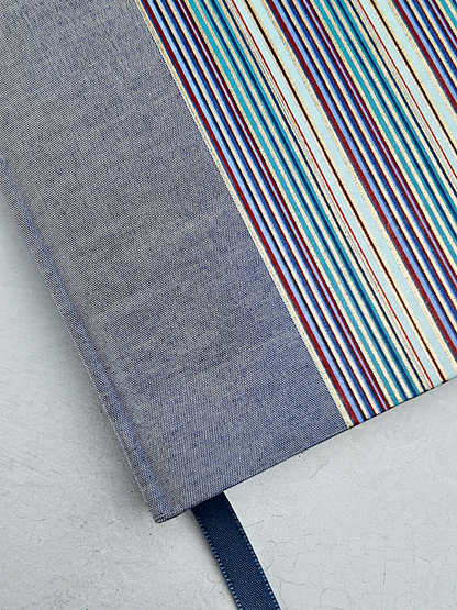 B5 192-page Hardcover Journal finished in Steel Blue Japanese book cloth and pinstripe Chiyogami paper