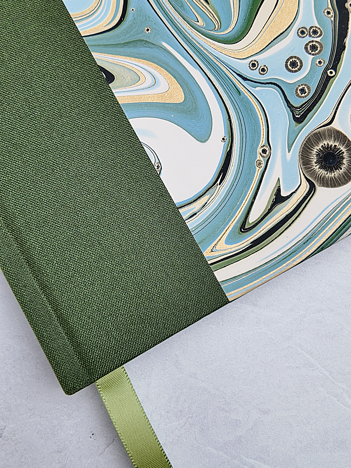 A5 160-page Hardcover Journal finished in Olive Verona book cloth and Renato Crepaldi Marble paper