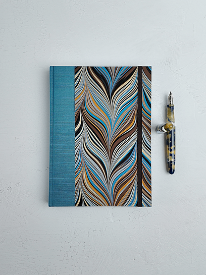 A5 160-page Hardcover Journal finished in Marine Blue Japanese book cloth and Renato Crepaldi Marble paper
