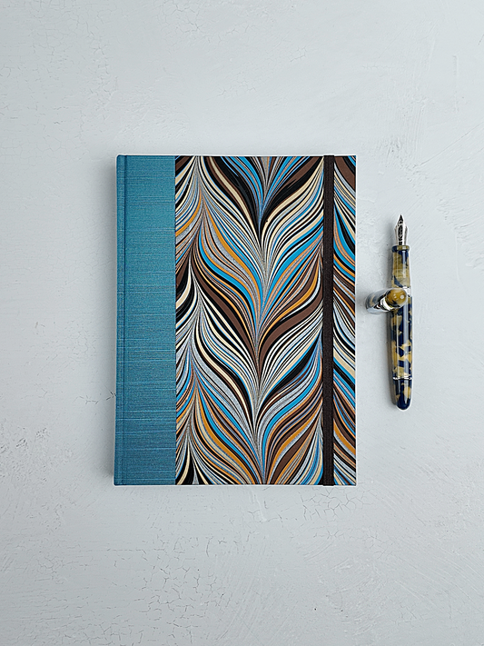 A5 160-page Hardcover Journal finished in Marine Blue Japanese book cloth and Renato Crepaldi Marble paper