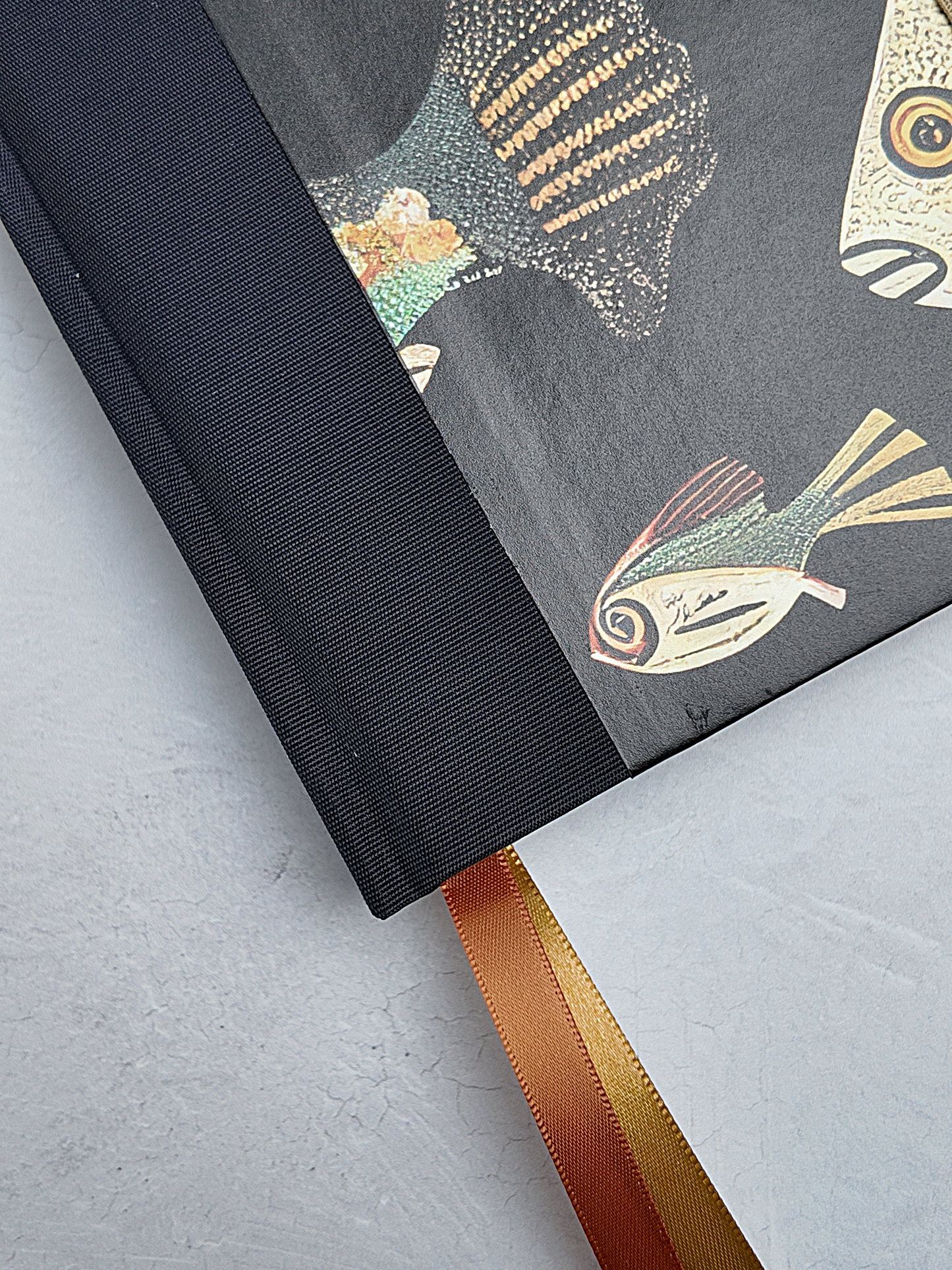 A5 160-page Hardcover Journal finished in Black Japanese book cloth and Fish motif print