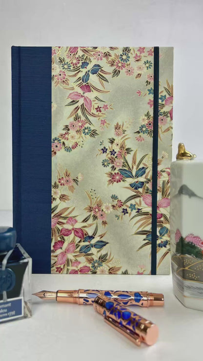 A5 160-page Hardcover Journal finished in Cadet Blue Japanese book cloth and Vintage Orchid Chiyogami Paper