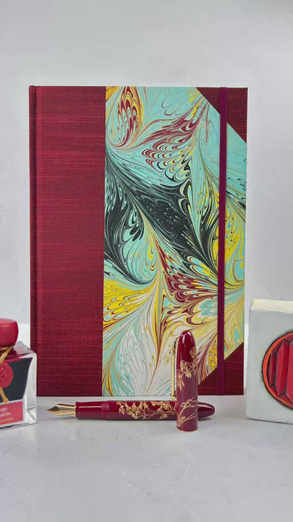 B5 192-page Hardcover Journal finished in Dark Red Japanese book cloth and hand marbled paper by Daniel Gaál