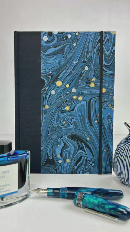 A5 160-page Hardcover Journal finished in Black Japanese book cloth and Renato Crepaldi hand marbled decorative paper