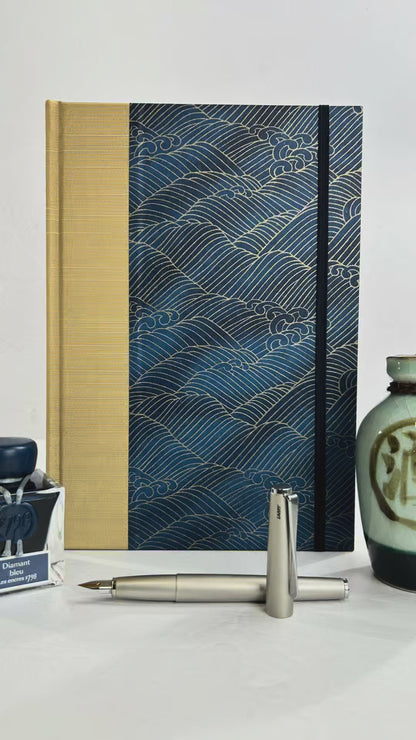 A5 160-page Hardcover Journal finished in soft gold Japanese book cloth and golden waves on blue Chiyogami Paper