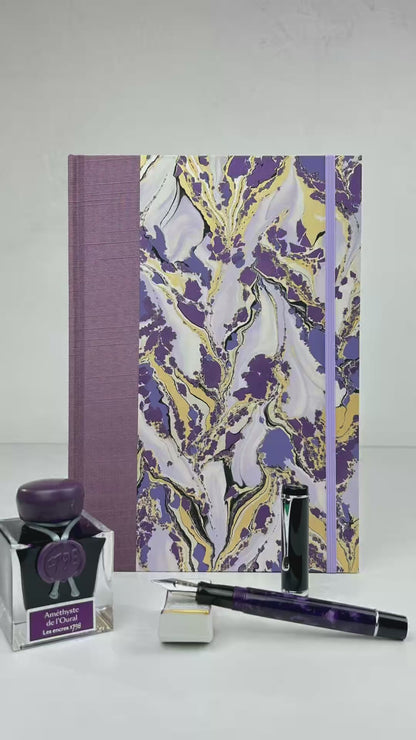 B5 192-page Hardcover Journal finished in plum Japanese book cloth and hand marbled paper by Renato Crepaldi